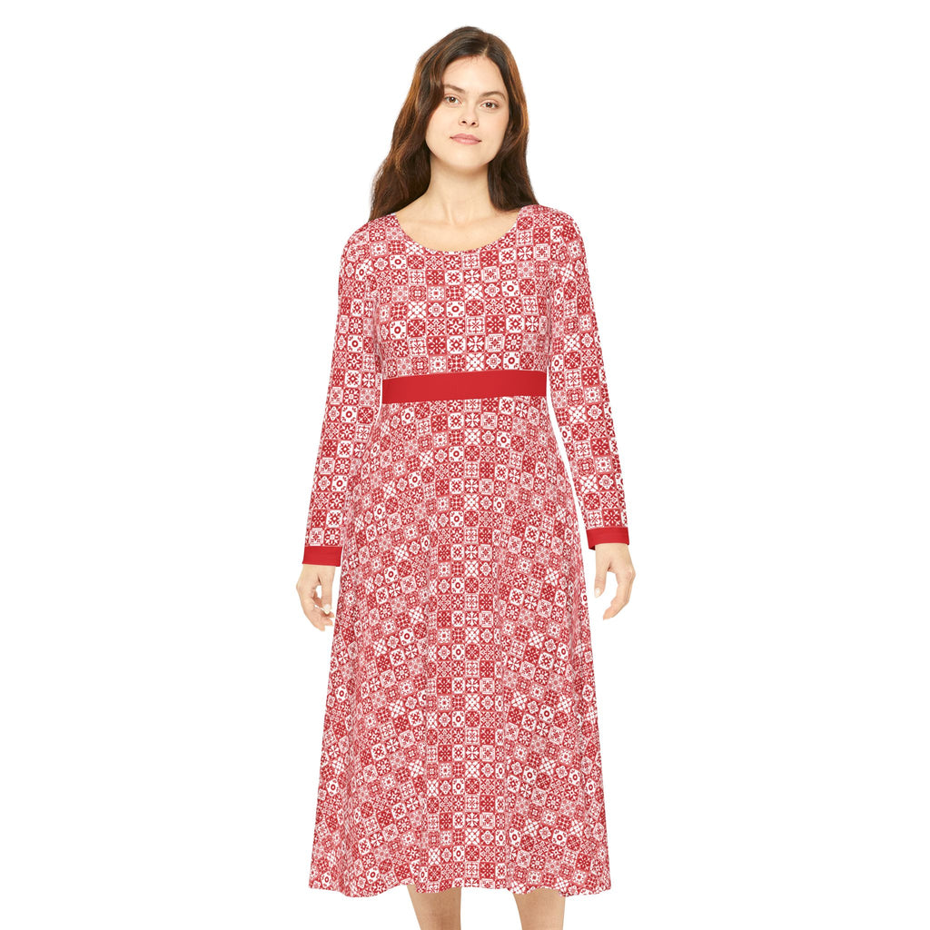 Woman wearing a red patterned dress on a white background