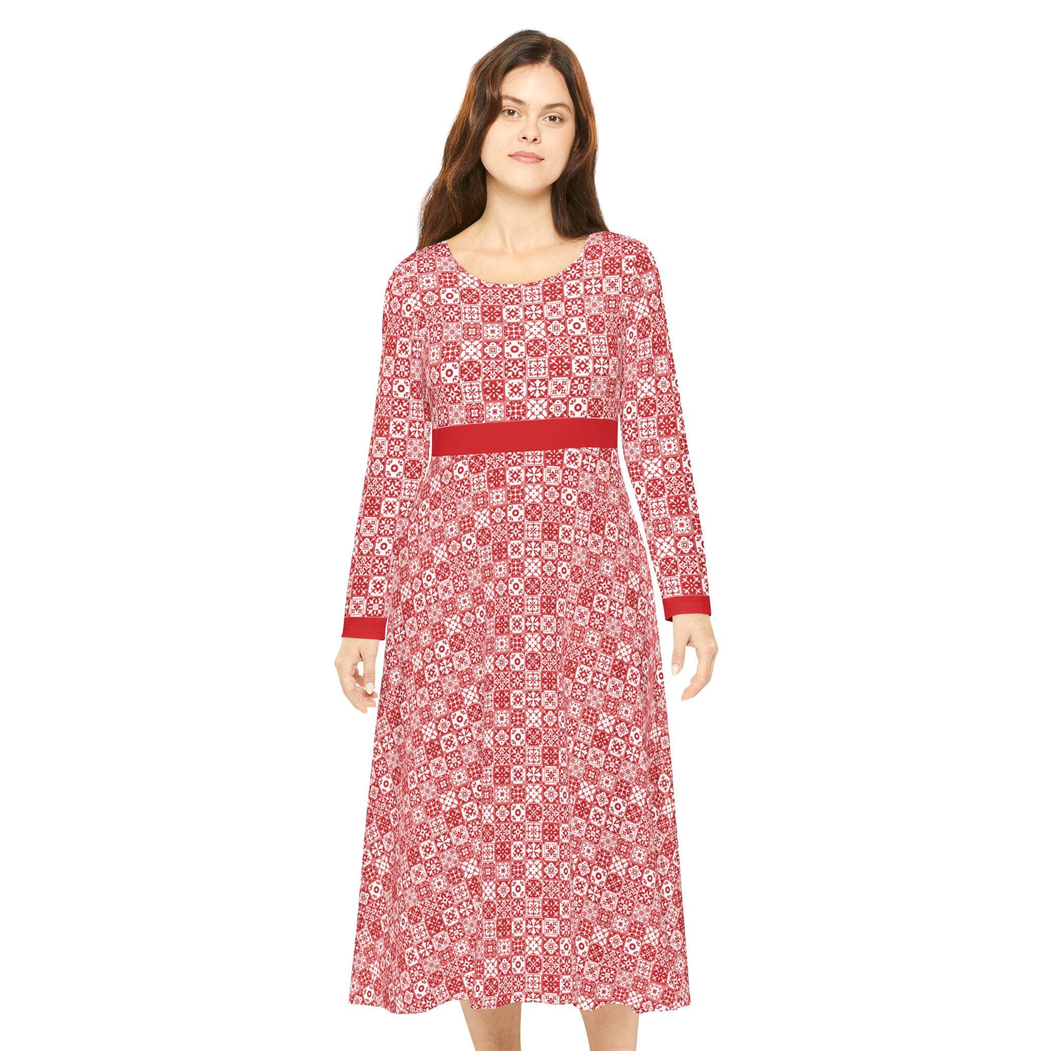 Woman wearing a red patterned dress on a white background