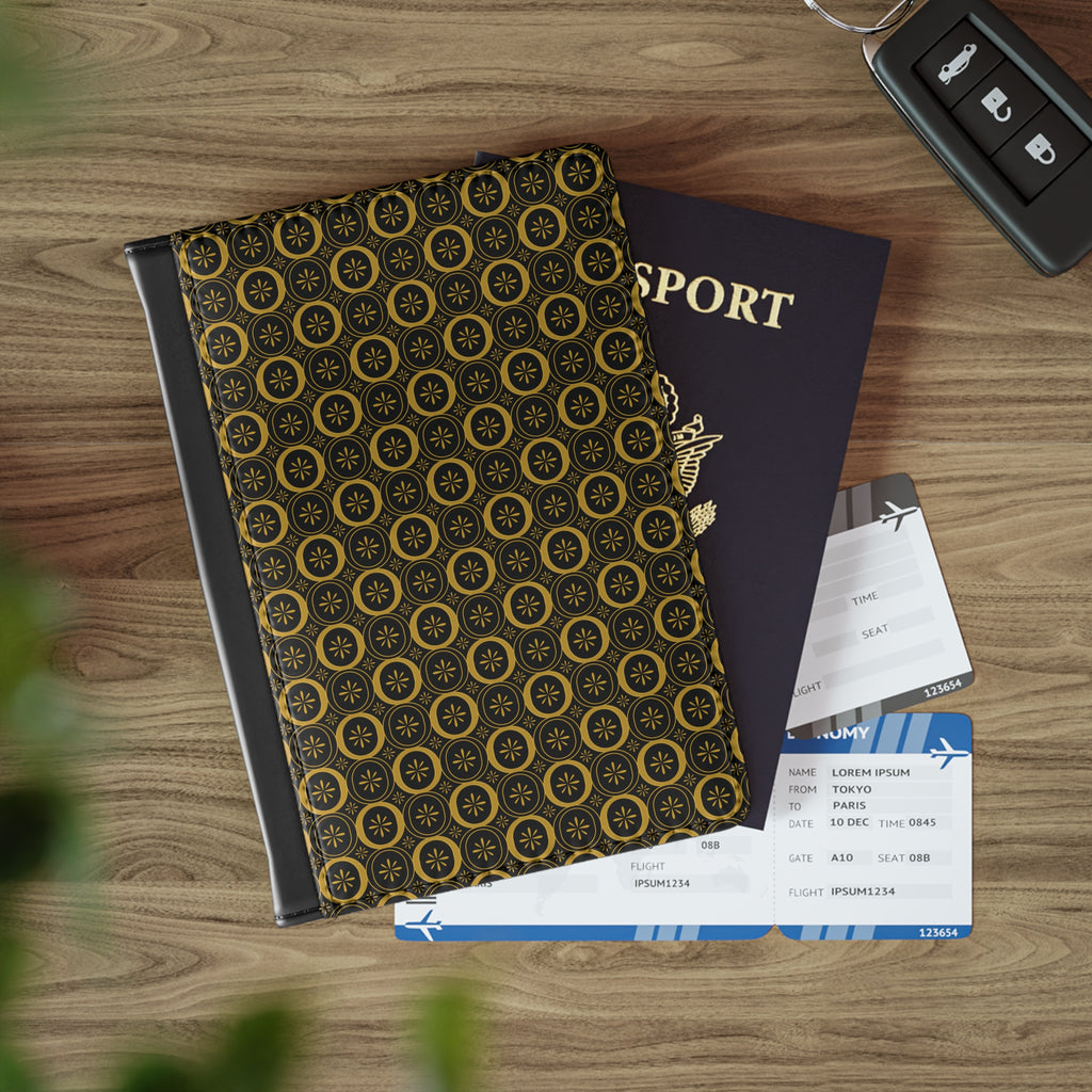 Patterned notebook, passport, and airline tickets on a wooden surface